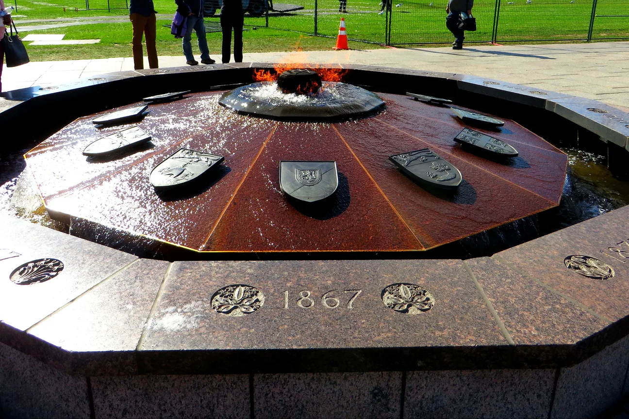 The Centennial Flame monument on Parliament Hill's grounds, with its ring of provincial and territorial shields
